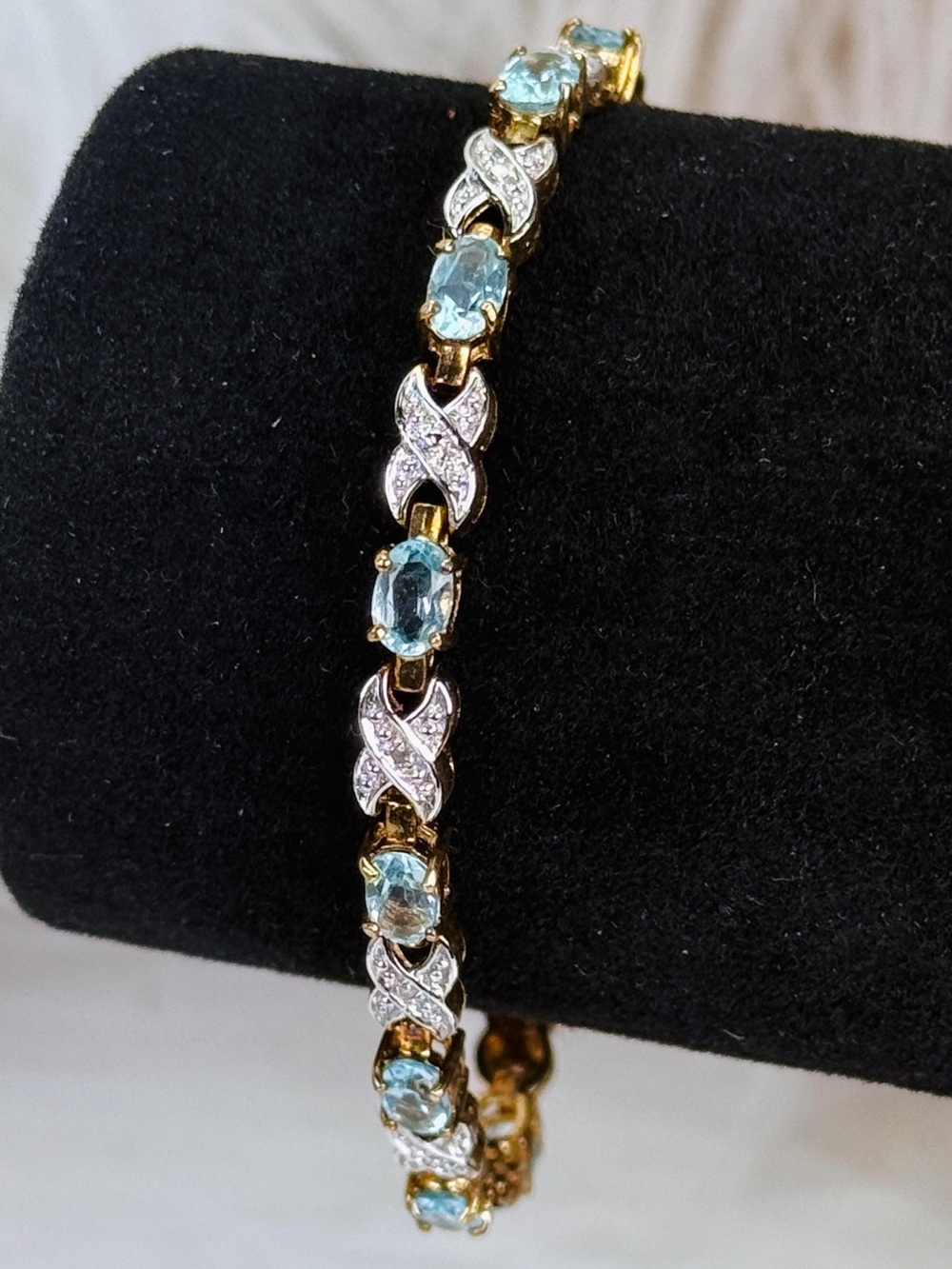 Vintage HAN 925 Aged goldtone, blue topaz linked bracelet